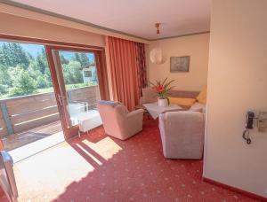 Postel nebo postele na pokoji v ubytování Appartement Pillersee