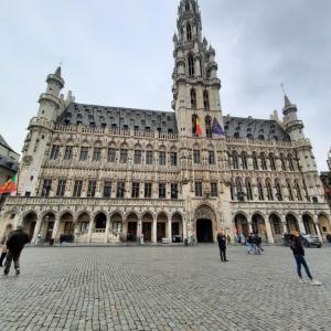 a large building with a clock tower on top of it at Sleep and Enjoy in Brussels