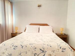 מיטה או מיטות בחדר ב-Hotel Vidal