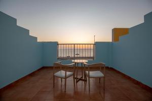 En balkong eller terrasse på Al Jar Resort - Families Only