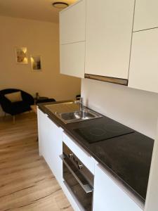Kuchyň nebo kuchyňský kout v ubytování Apartments Torggl