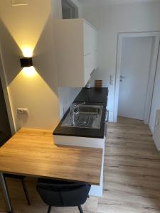 Kuchyň nebo kuchyňský kout v ubytování Apartments Torggl
