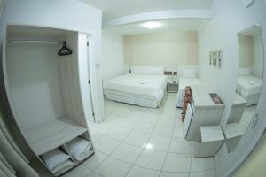 Postelja oz. postelje v sobi nastanitve Hotel Sambakia