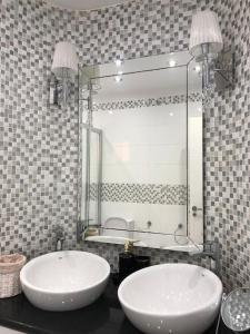 A bathroom at Apartamento con impresionantes vistas y piscina
