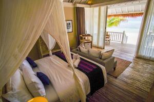 Ένα ή περισσότερα κρεβάτια σε δωμάτιο στο Sudamala Resort, Seraya, Flores