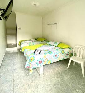 Postel nebo postele na pokoji v ubytování Hotel Y Restaurante La Quinta