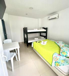 Postel nebo postele na pokoji v ubytování Hotel Y Restaurante La Quinta