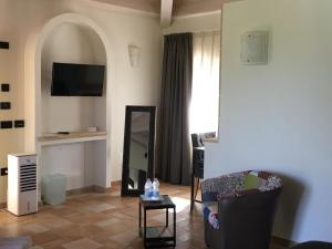 TV a/nebo společenská místnost v ubytování Villa Vento dei Cieli