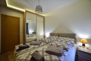 Katil atau katil-katil dalam bilik di Apartman D&D, Zlatibor