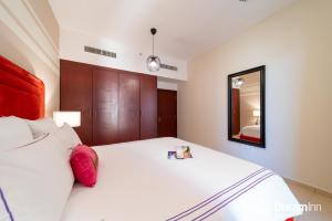 Postel nebo postele na pokoji v ubytování Dream Inn Apartments - Rimal JBR