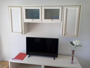 TV a/nebo společenská místnost v ubytování Las Torres Del Castillo-120 Palms
