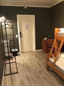 Postel nebo postele na pokoji v ubytování Aktivitetsbyen Gamle Fredrikstad