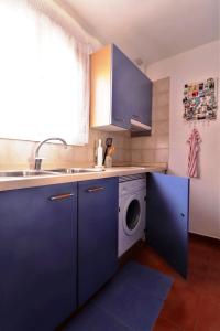 A kitchen or kitchenette at Apartment with large relax terrace and top equipment