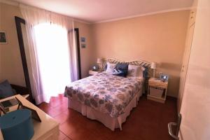 A bed or beds in a room at Apartment with large relax terrace and top equipment