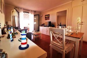 A kitchen or kitchenette at Apartment with large relax terrace and top equipment