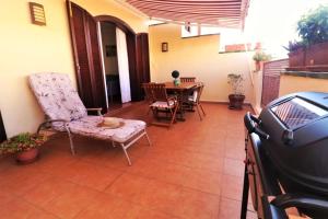 A seating area at Apartment with large relax terrace and top equipment
