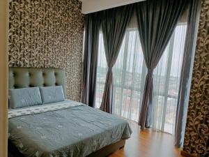 Postel nebo postele na pokoji v ubytování Sekinchan HighLevel SeaView Homestay 高楼 看海 阳台民宿 + 37 fotografií