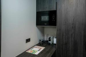 Kuchyň nebo kuchyňský kout v ubytování Mochoruralhome estudio