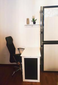 Телевизор и/или развлекательный центр в Alójate en Vigo! Casita bien equipada
