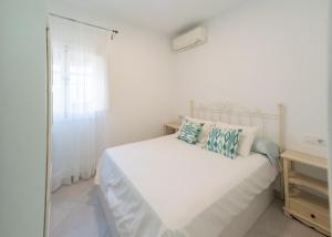 Posteľ alebo postele v izbe v ubytovaní Apartamento Centro Calle Plata
