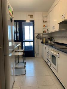 Kuchyňa alebo kuchynka v ubytovaní Apartamento Náutico