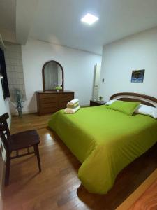 Postel nebo postele na pokoji v ubytování DEPARTAMENTO en La Paz MUNDO LUNA