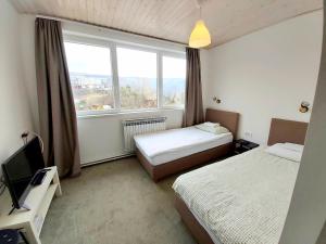 Postel nebo postele na pokoji v ubytování Hostel Dharma