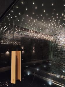 a room with a ceiling with lights on it at Lure Hotel & Spa - Adults Only in Mellieħa