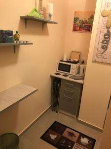 Kuchyňa alebo kuchynka v ubytovaní Menta apartman