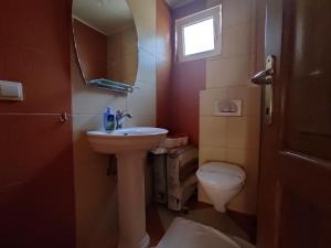 Koupelna v ubytování Apartmani Tomić 4*