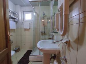 Koupelna v ubytování Apartmani Tomić 4*