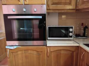 Kuchyň nebo kuchyňský kout v ubytování Apartmani Tomić 4*