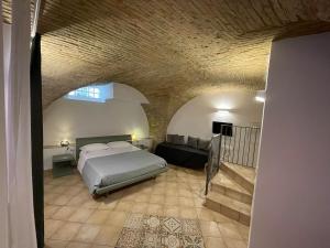 A bed or beds in a room at B&B Sacca