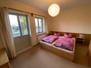 Postel nebo postele na pokoji v ubytování Haus Gamrigblick