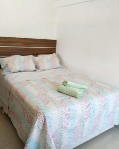 En eller flere senge i et værelse på Lindo Apartamento com vista para o Mar - Mirante do Américo!