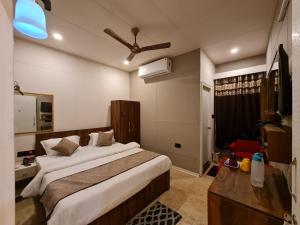 Hotel Aurelia Pearl客房内的一张或多张床位