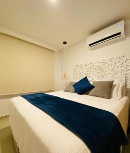 En eller flere senge i et værelse på Montu701B