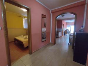 Postel nebo postele na pokoji v ubytování Apartmani Tomić 4*