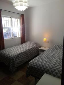 Posteľ alebo postele v izbe v ubytovaní Casa Las Maravillas