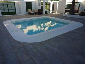Bazén v ubytování Casa Su Lanzarote nebo v jeho okolí
