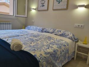 Posteľ alebo postele v izbe v ubytovaní EL RINCON DE LA MERCED junto Laurel Aire acondicionado By Apartamentos Logrono
