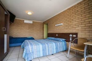 Postel nebo postele na pokoji v ubytování Grand Hotel Motel