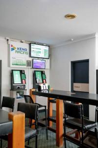 TV a/nebo společenská místnost v ubytování Grand Hotel Motel