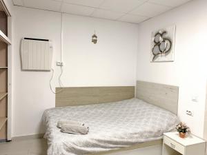 Postel nebo postele na pokoji v ubytování Casa Sergio de Novelda