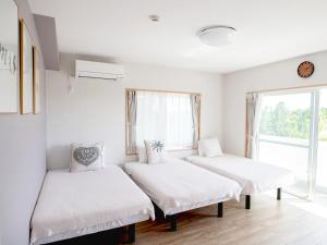Fotografie z fotogalerie ubytování Guesthouse Koa v destinaci Mijakodžima