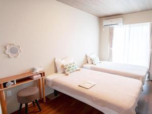 Fotografie z fotogalerie ubytování Guesthouse Koa v destinaci Mijakodžima