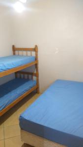 Двох'ярусне ліжко або двоярусні ліжка в номері RESIDENCIAL FÁVERO