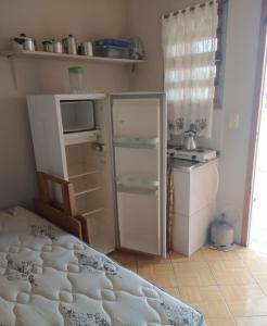 Kuchyň nebo kuchyňský kout v ubytování RESIDENCIAL FÁVERO