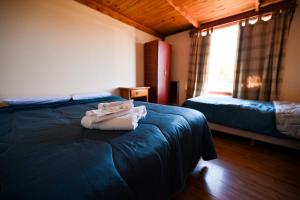 Uma cama ou camas num quarto em Las Moras Cabañas