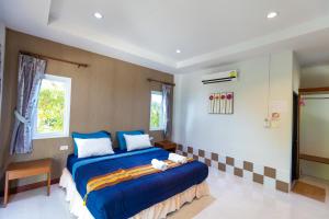 Ein Bett oder Betten in einem Zimmer der Unterkunft Nature Line Resort